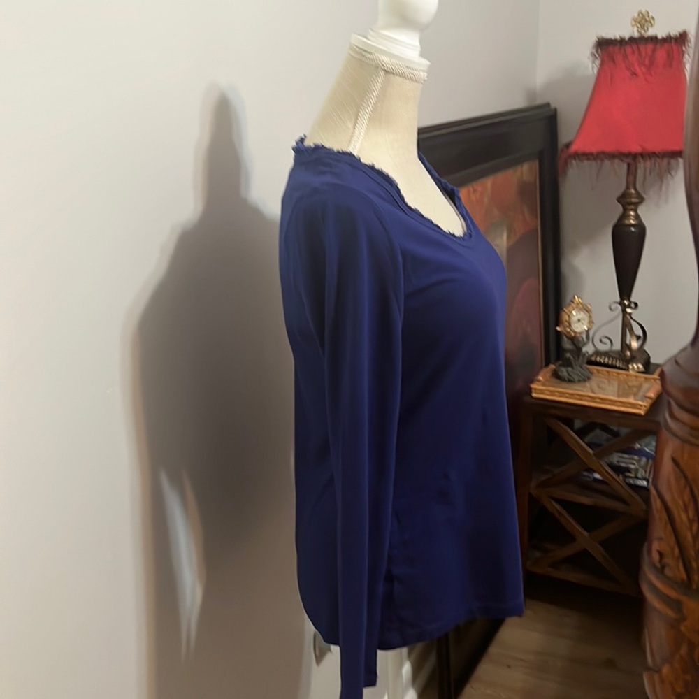 Navy t-shirt, lower cut U neck very soft.